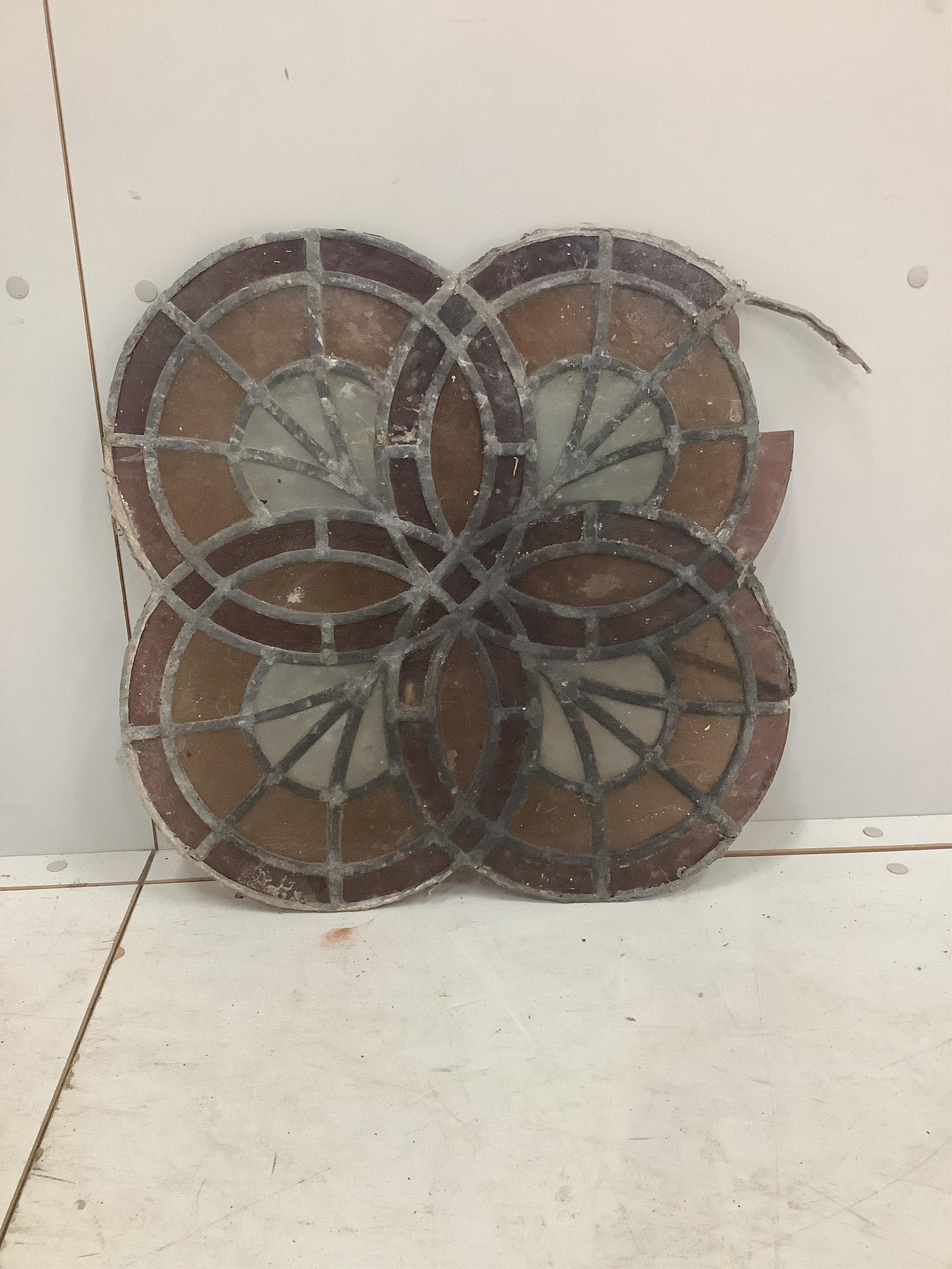 A set of three stained glass panels, 50 x 50cm. Condition - one section of glass missing and some leading missing